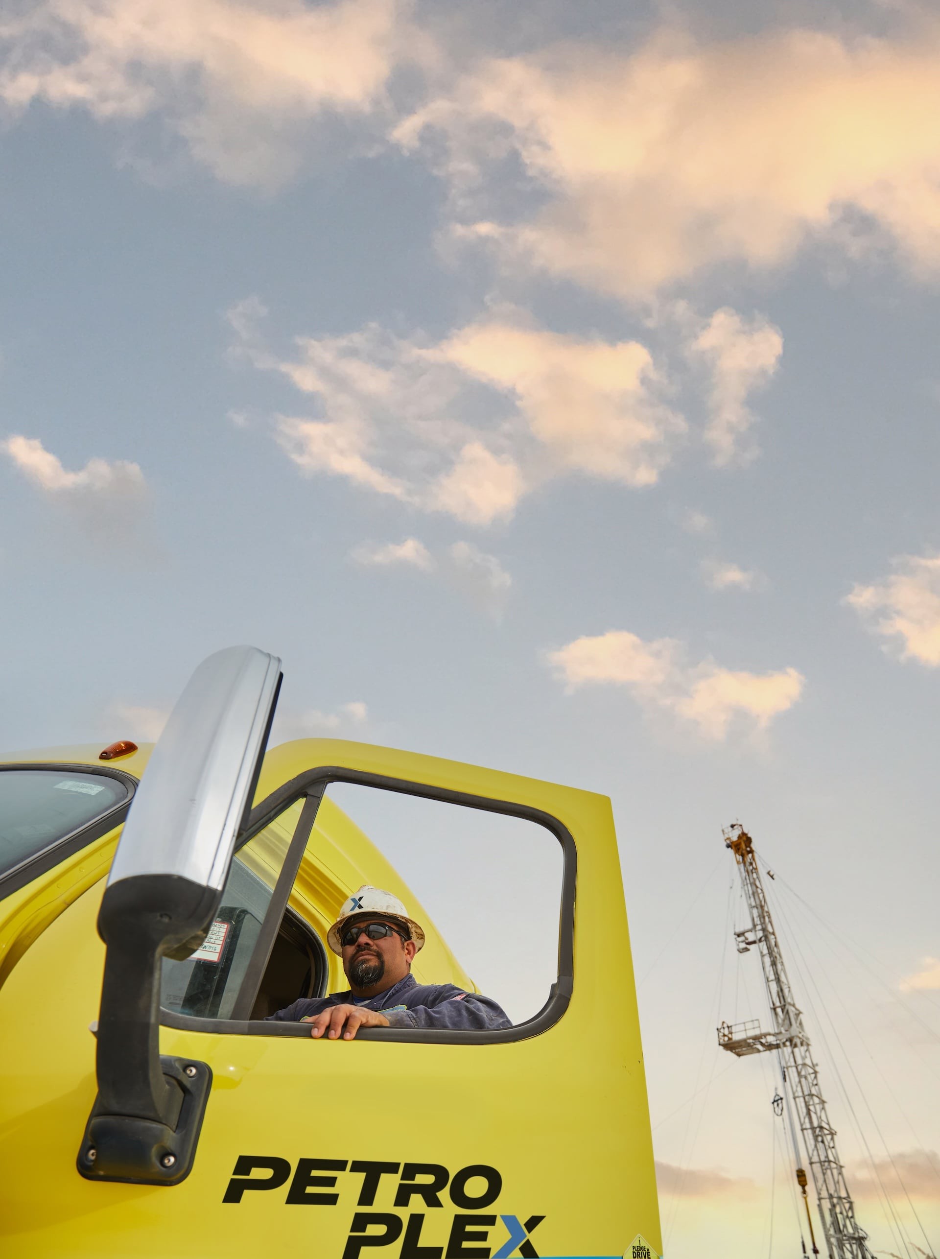 Petroplex worker looking out truck window